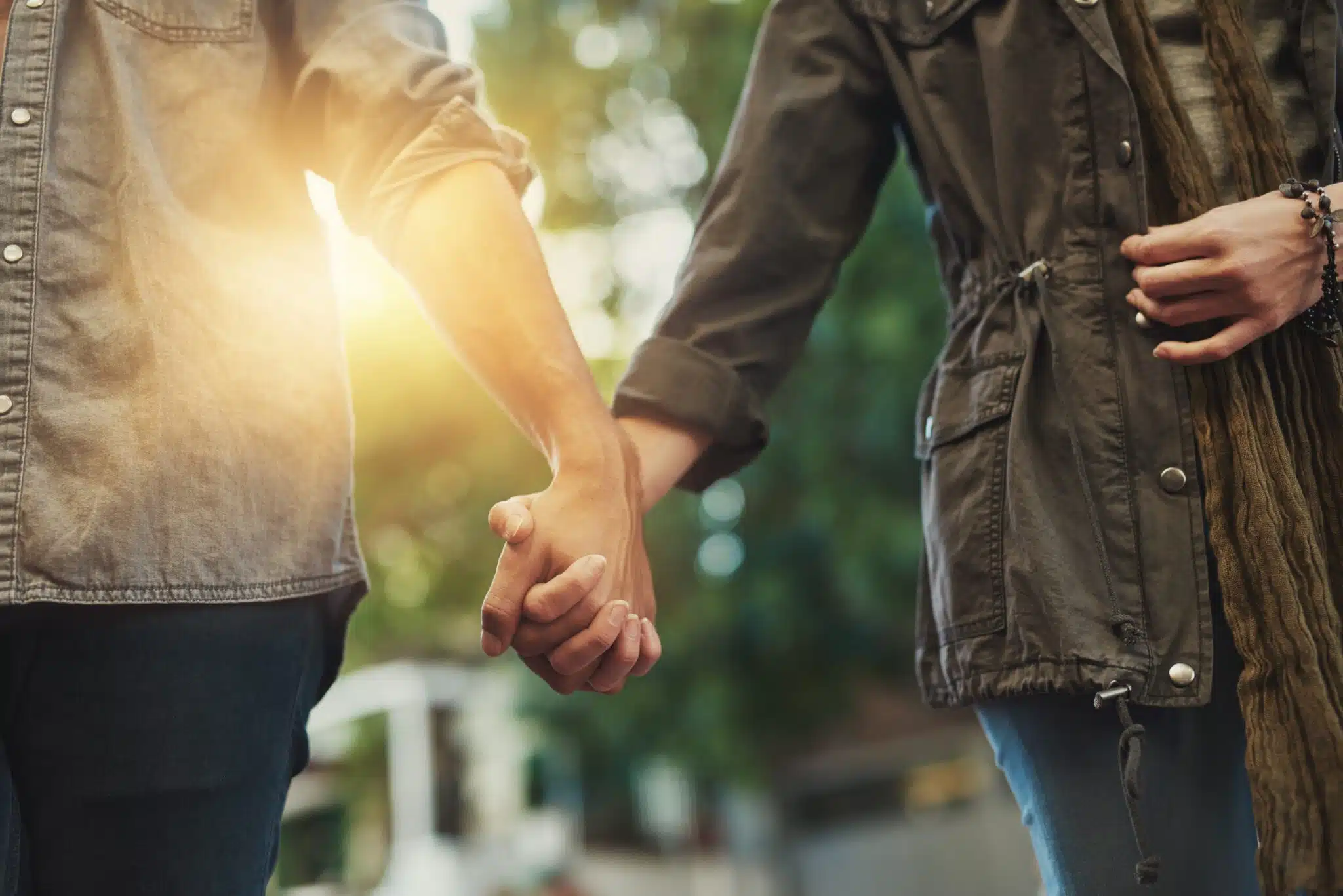 love,,holding,hands,and,couple,in,city,for,travel,,journey
